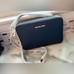 Brand new Michael Kors satchel.